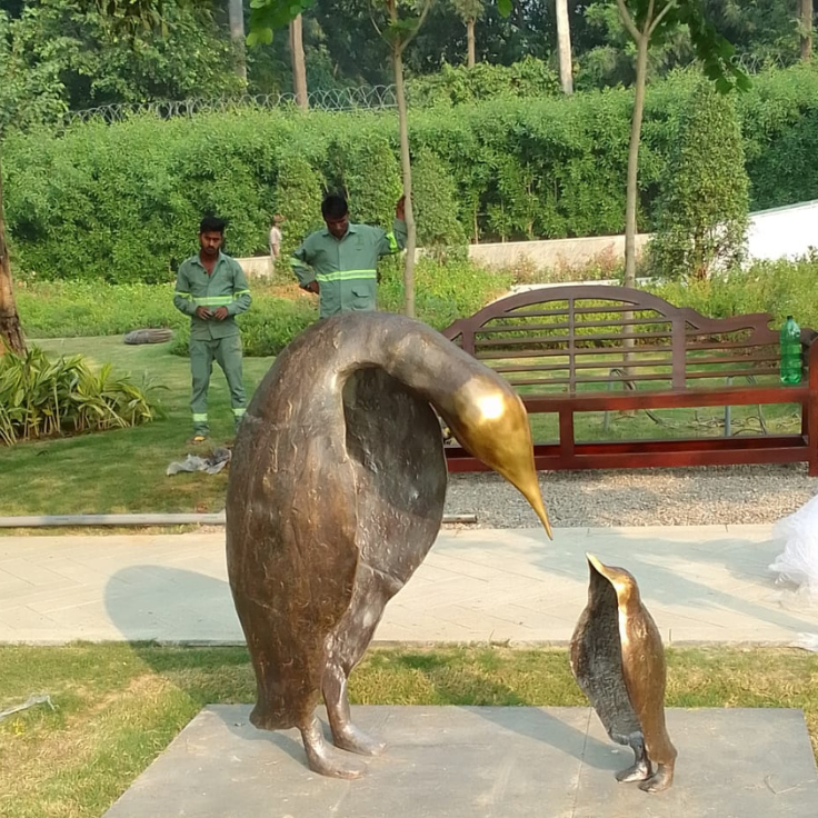 Maternal Devotion Penguin Sculpture – Luxury Outdoor Bronze Garden Art